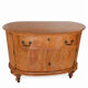 Half-moon commode from 1900 in lemon tree veneer, curved shape.