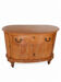 Half-moon commode from 1900 in lemon tree veneer, curved shape.