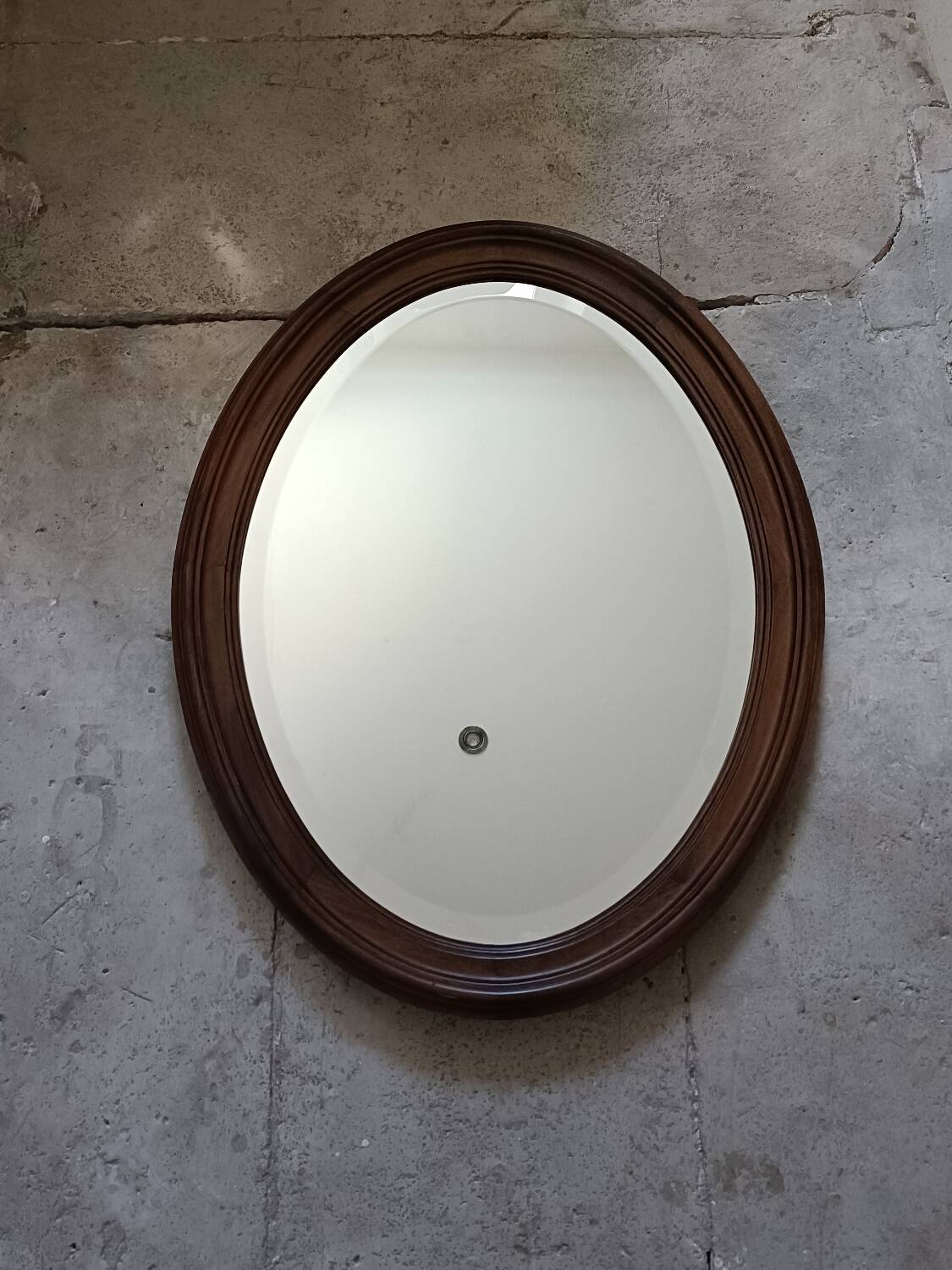 Antique oval beveled mirror