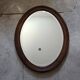 Antique oval beveled mirror