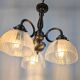 Antique Art Deco chandelier with 3 arms in patinated metal and ribbed glass.