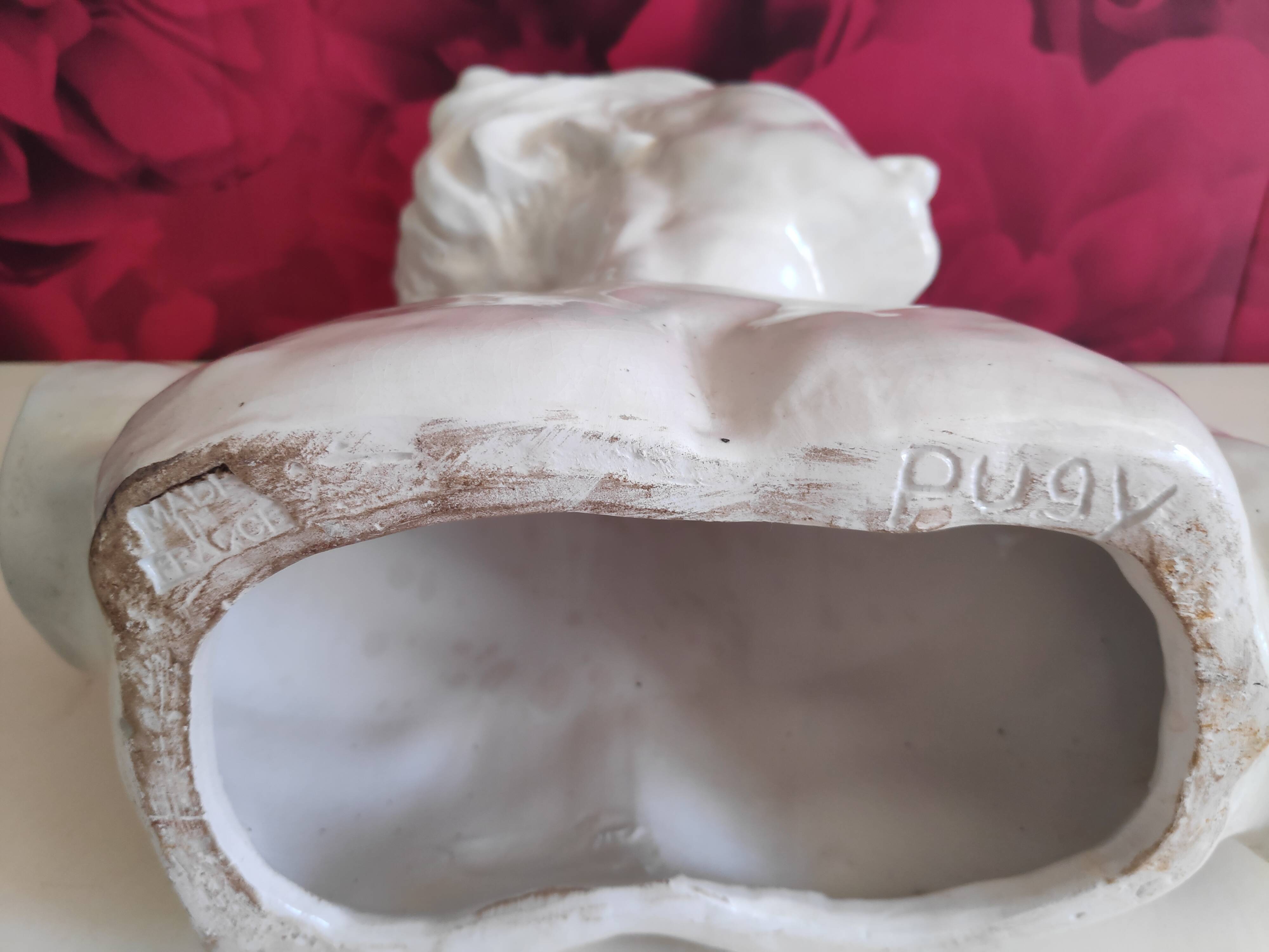 Bust of J. Mermoz in white cracked ceramic by H. Laurens