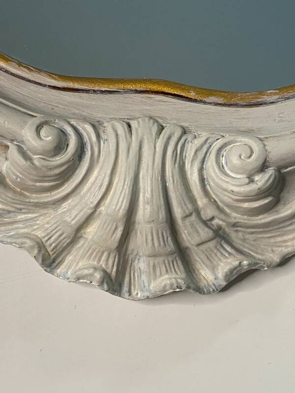 Magnificent patinated and gilded baroque style mirror