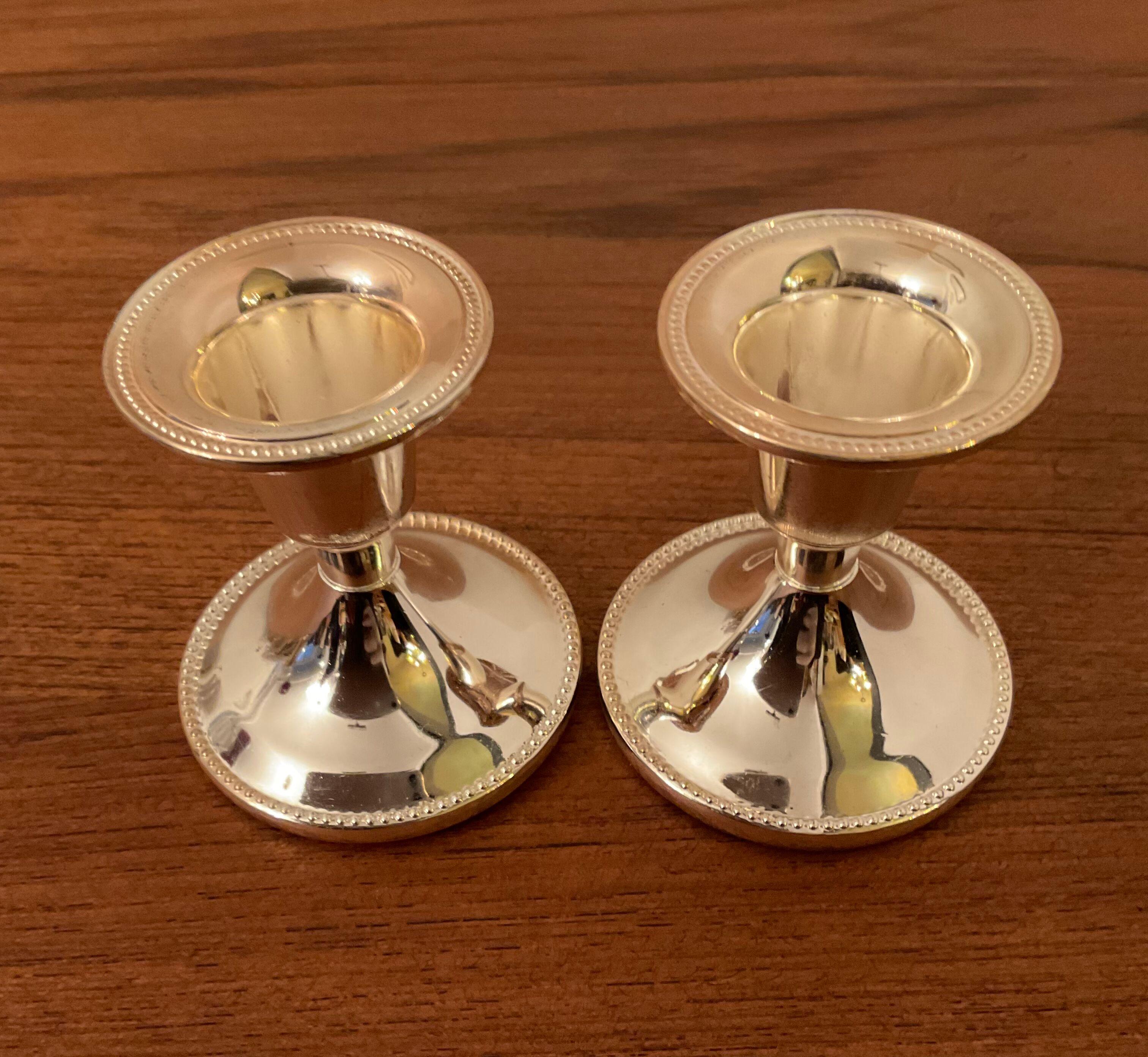 Pair of vintage silver metal candle holders