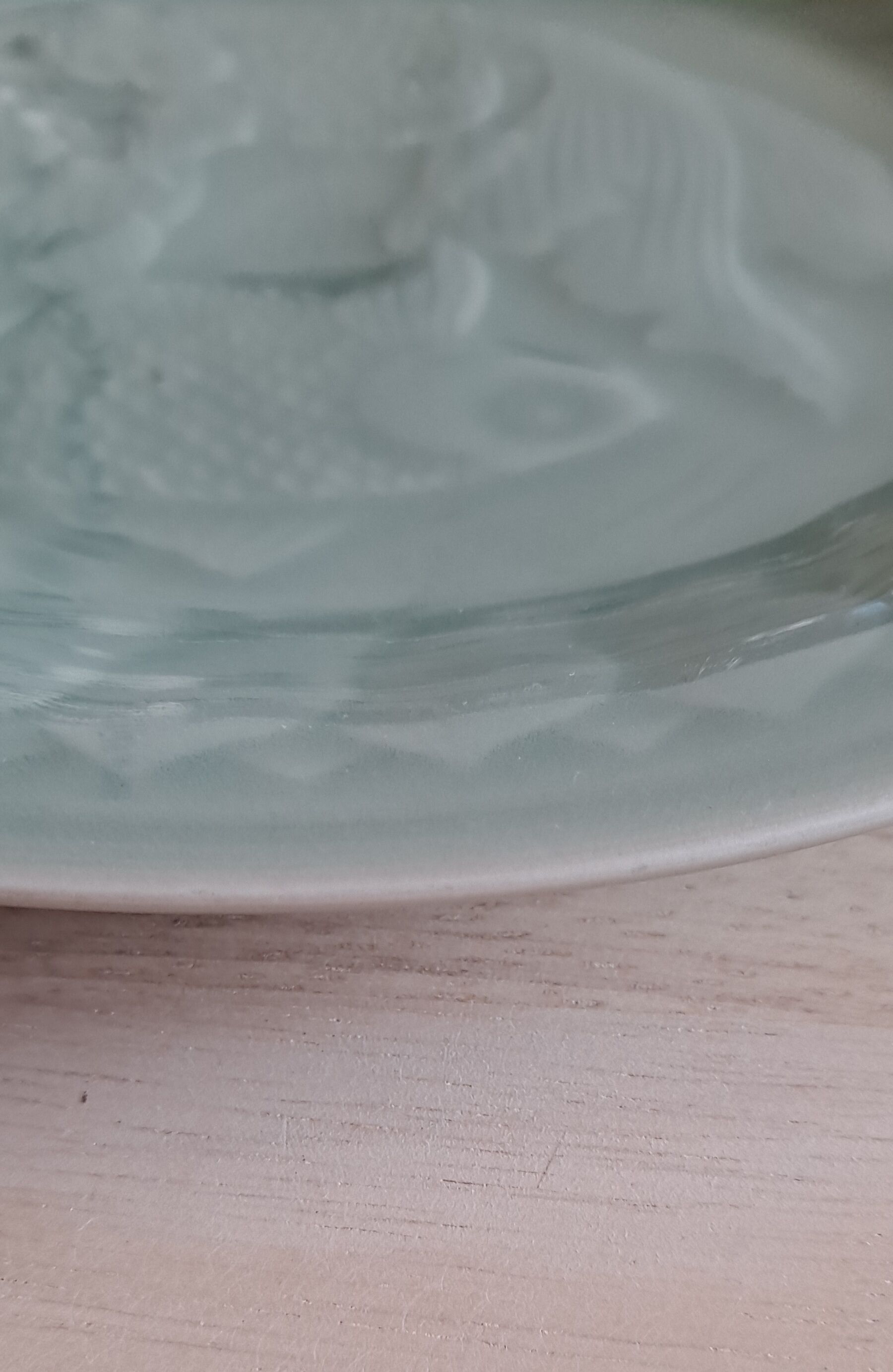 Celadon green plate with fish