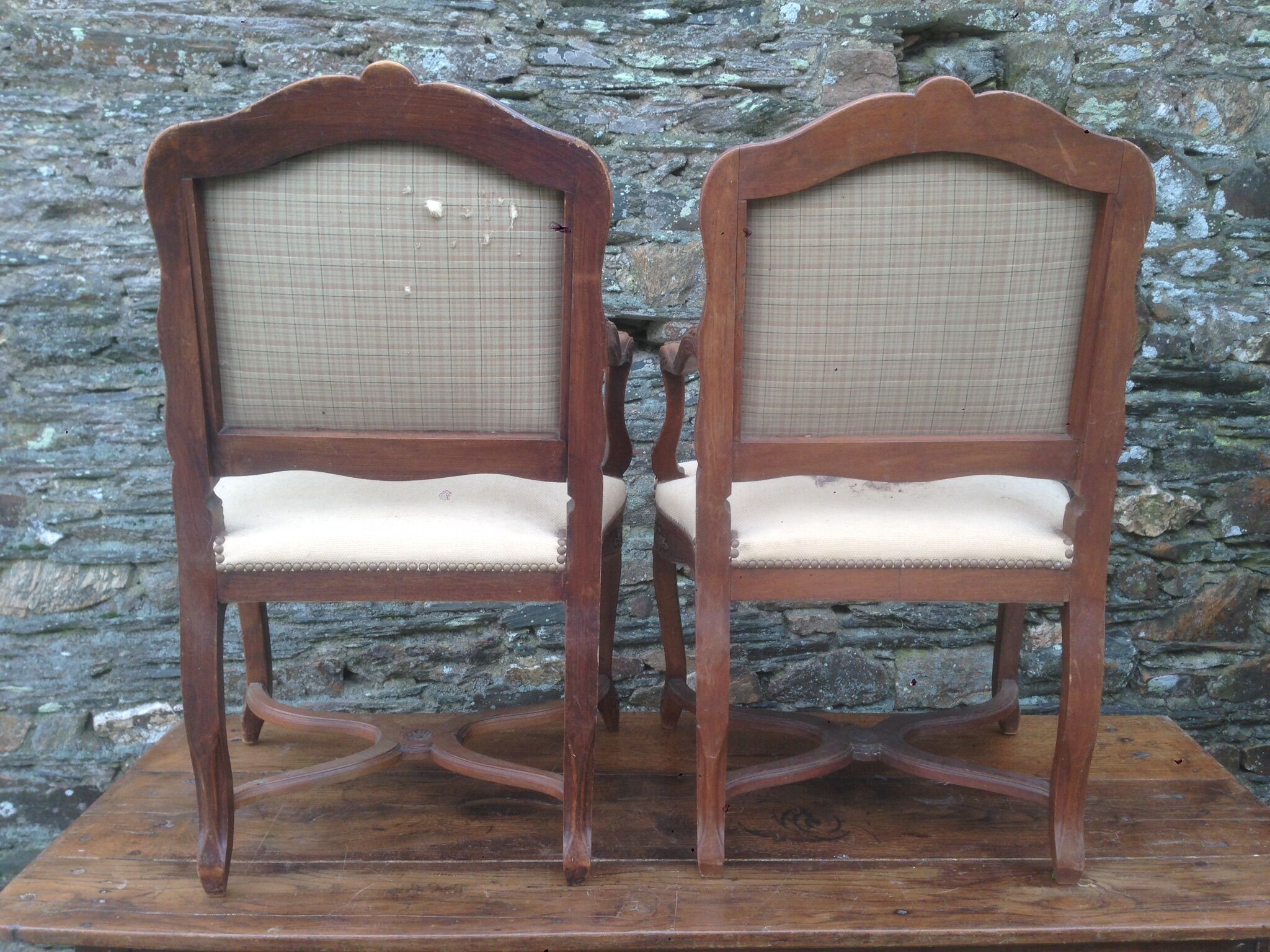 Pair of Louis XV-style walnut armchairs