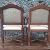 Paire de fauteuils de style Louis XV en noyer