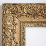 Gilded wooden and stucco frame