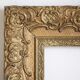 Gilded wooden and stucco frame