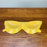 Vintage yellow ceramic glasses emptier