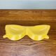 Vintage yellow ceramic glasses emptier