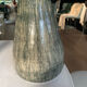 New green ceramic artisanal vase.