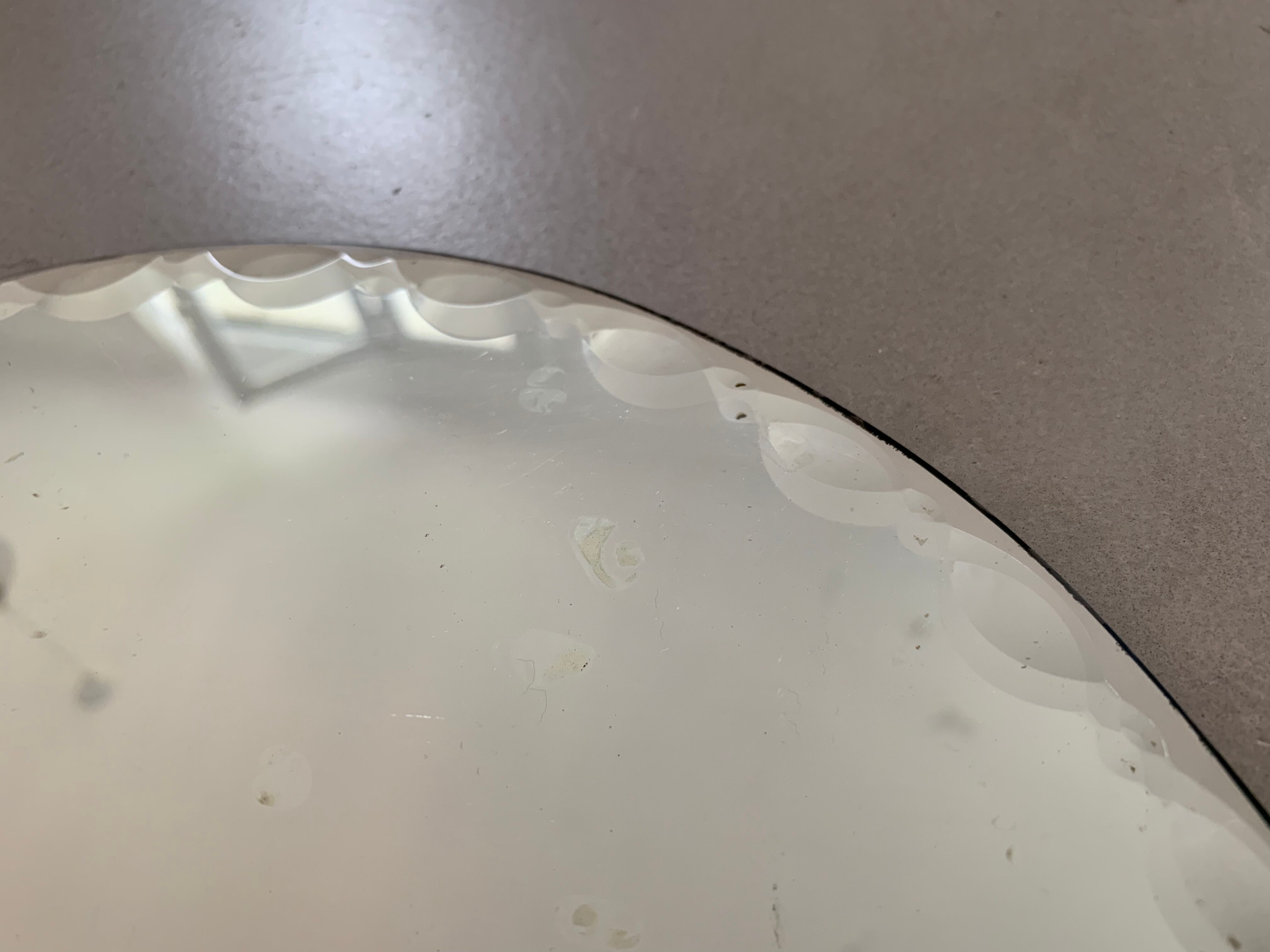 Old beveled oval mirror