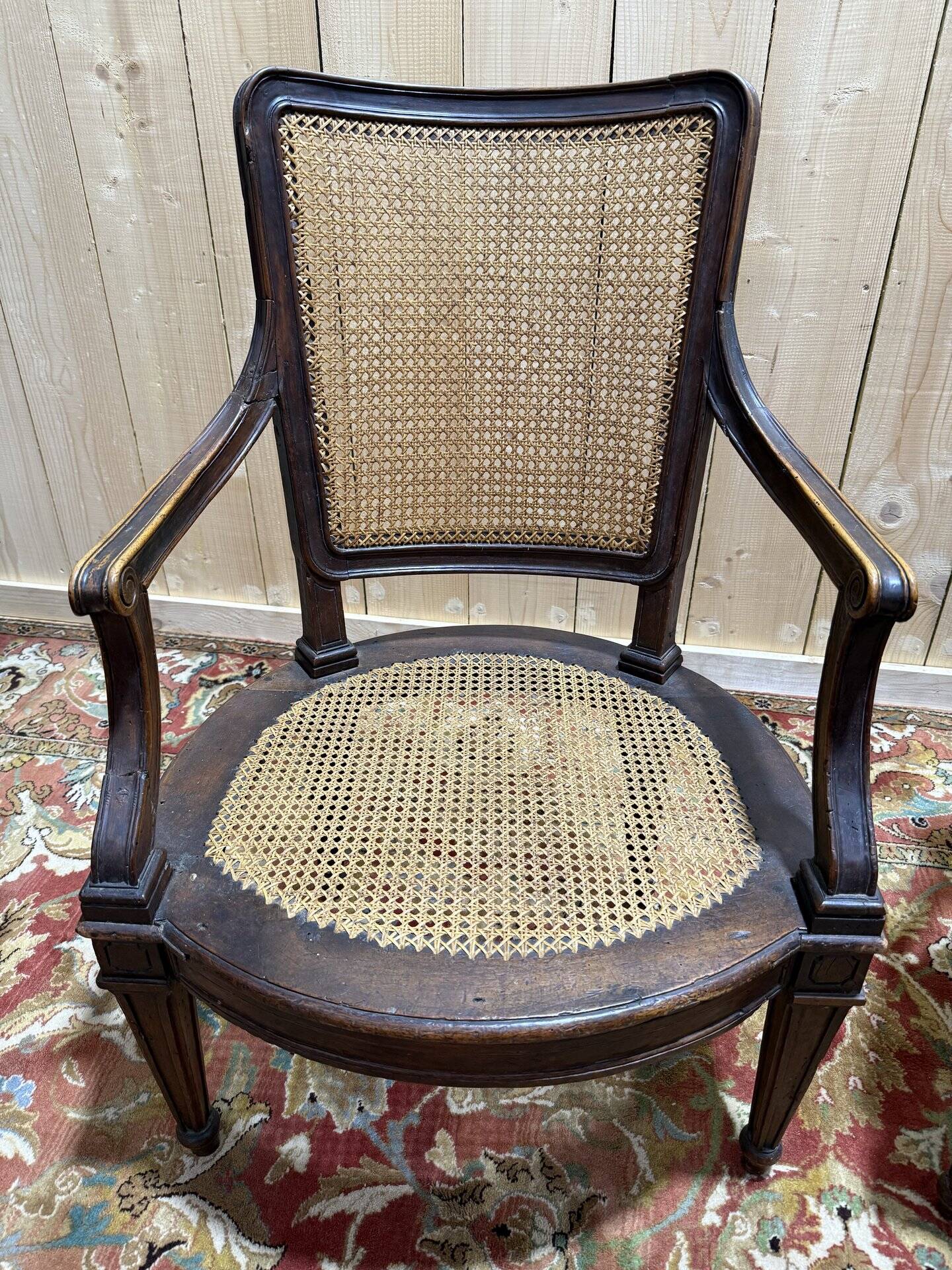 Pair of Louis XVI period caned armchairs