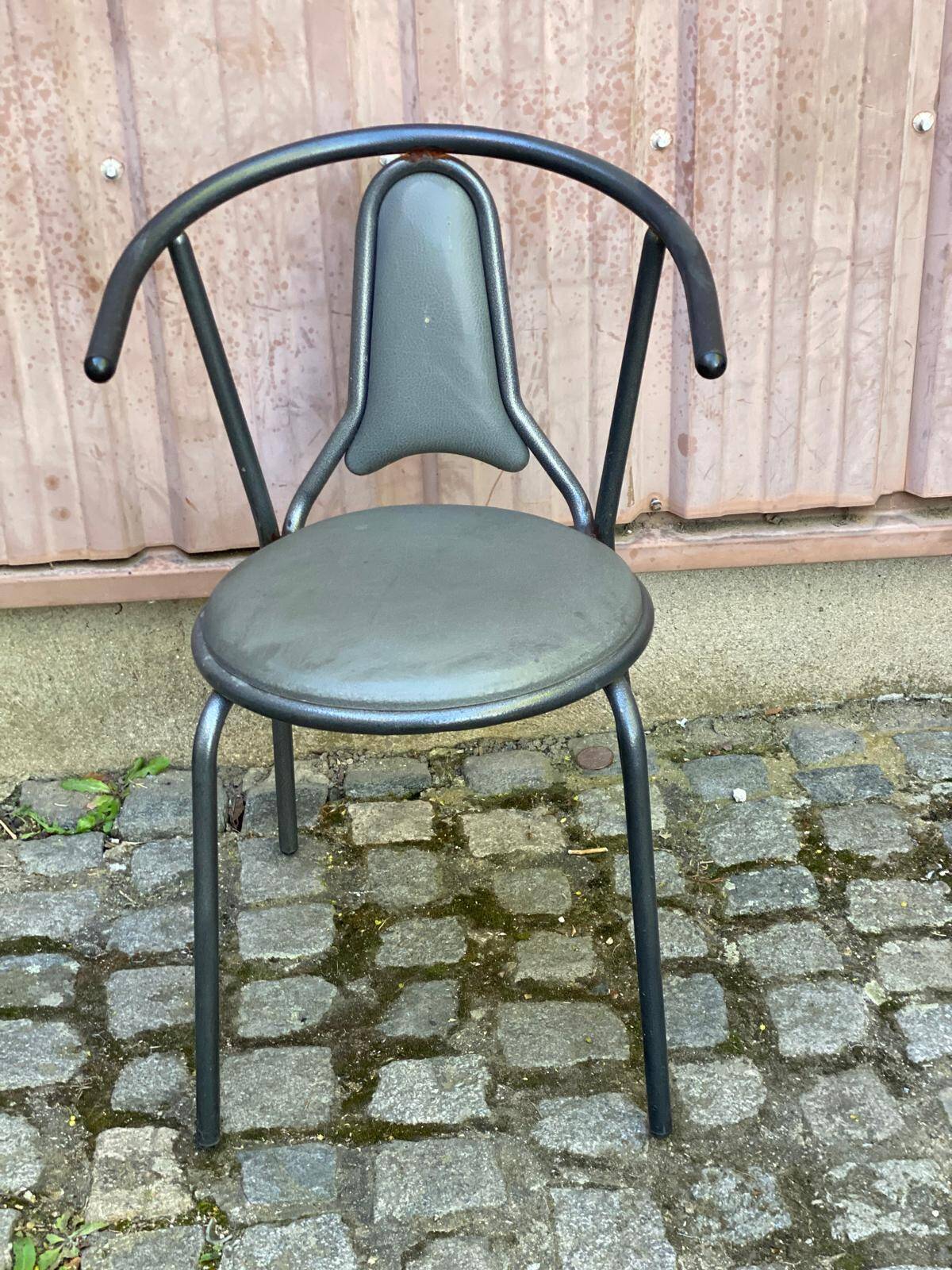 Vintage bistro chair in steel and grey leather from the 1980s.