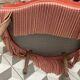 Pink velvet toad armchair