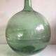 Demijohn old transparent green, estimated capacity around 12 to 15L