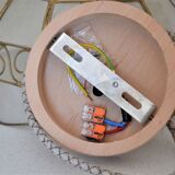 Mother-of-pearl and brass suspension