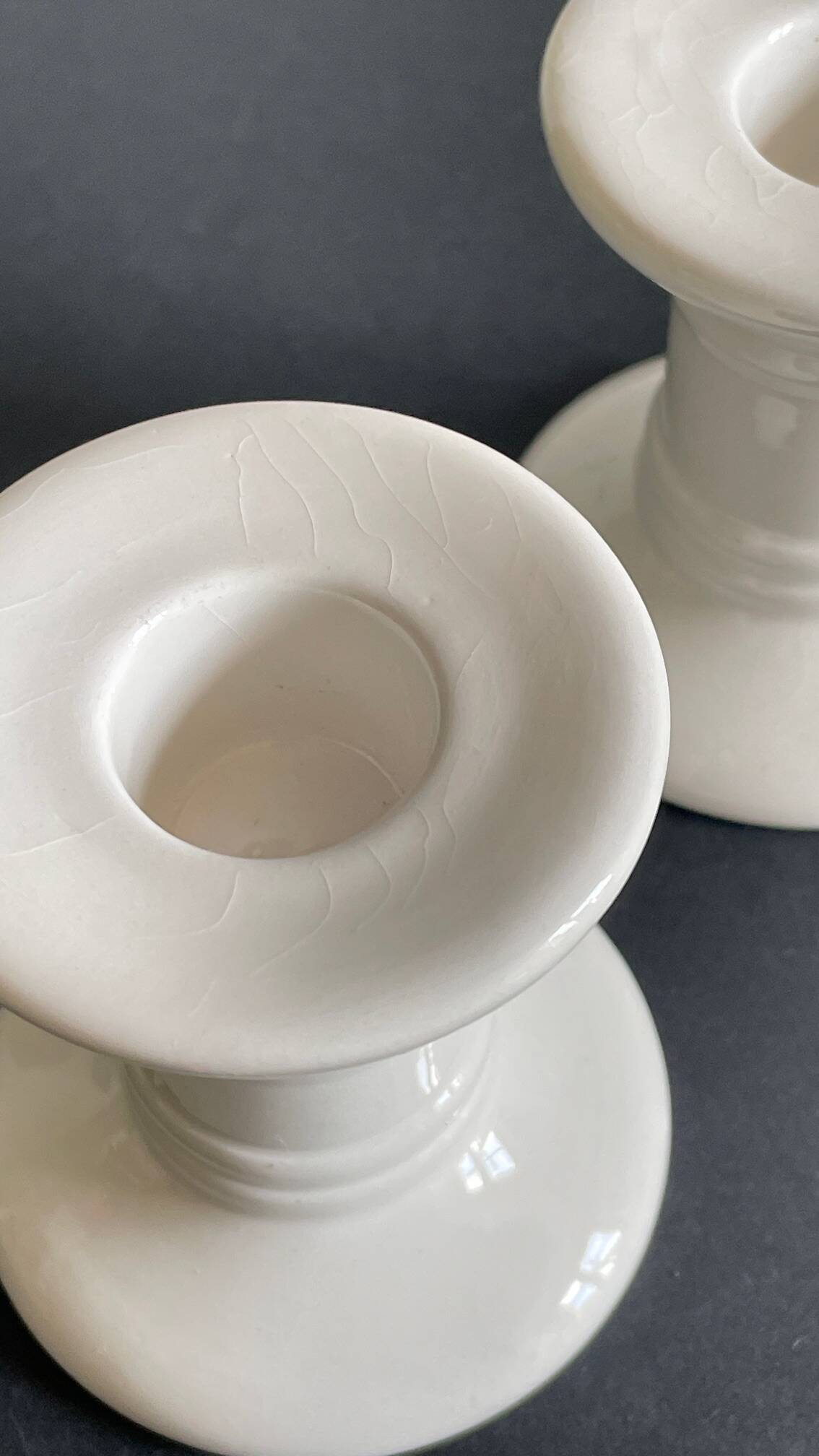 Pair of White Ceramic Candlesticks