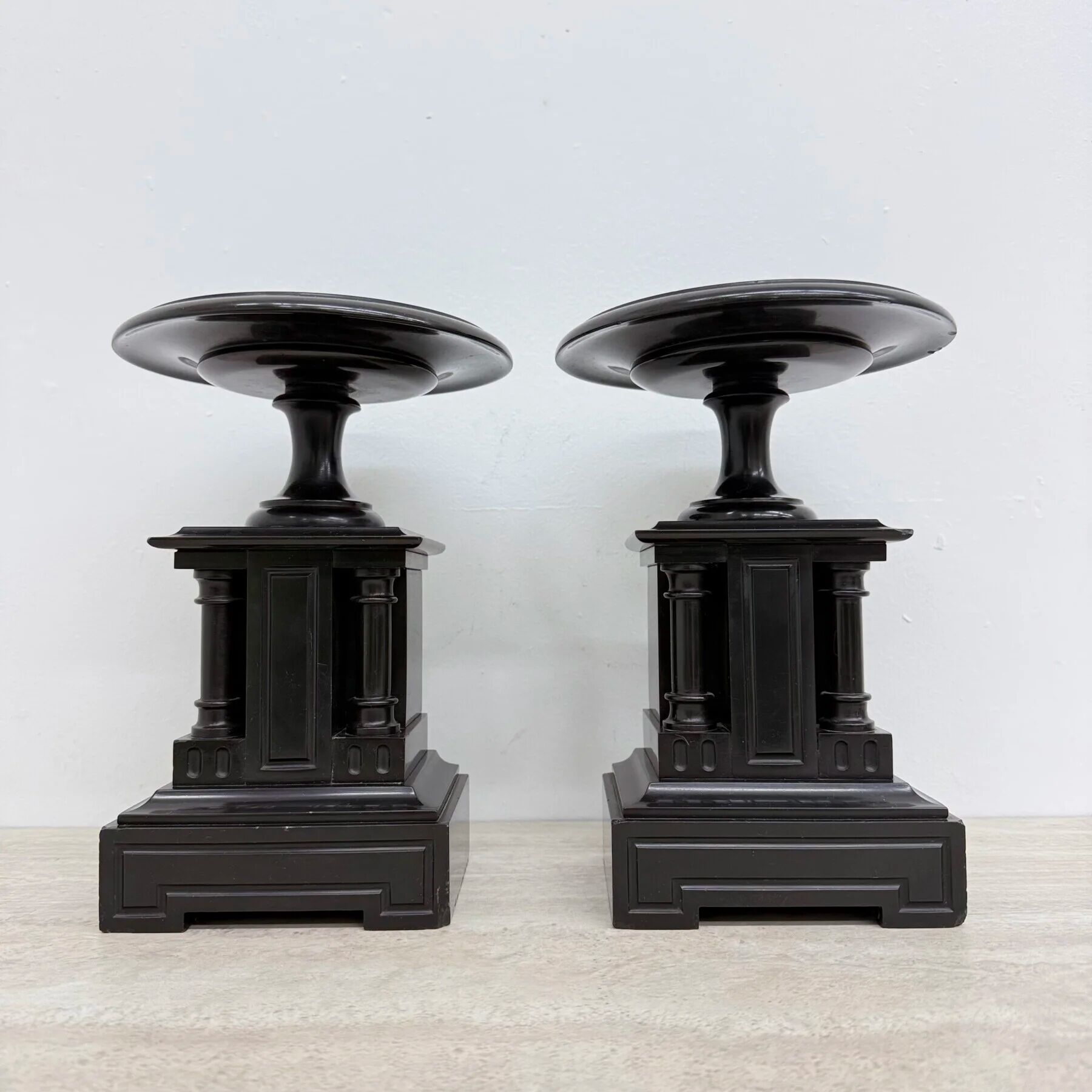 Antique French black marble cassoulets gilt decor pedestals neoclassical pair, 1900s