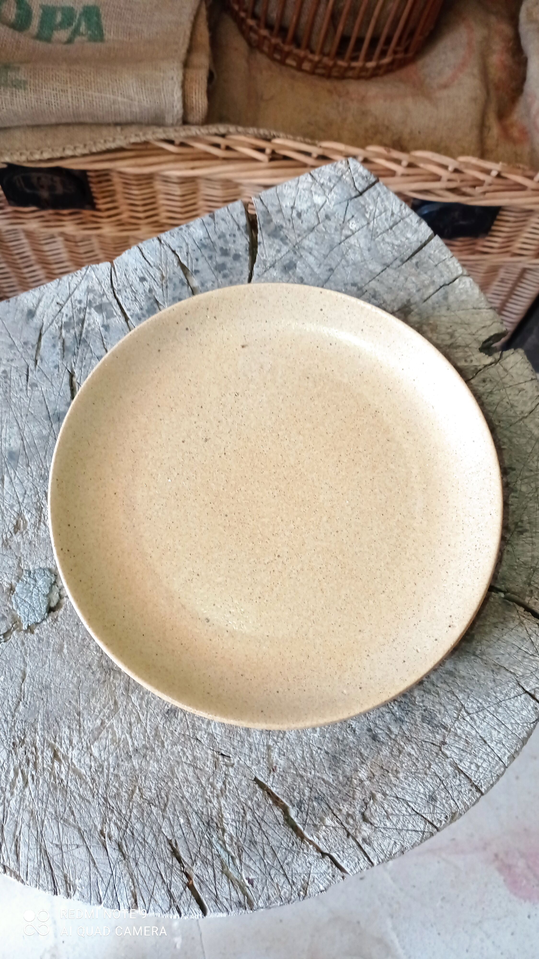 Set of seven plates in sandstone