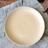 Set of seven plates in sandstone