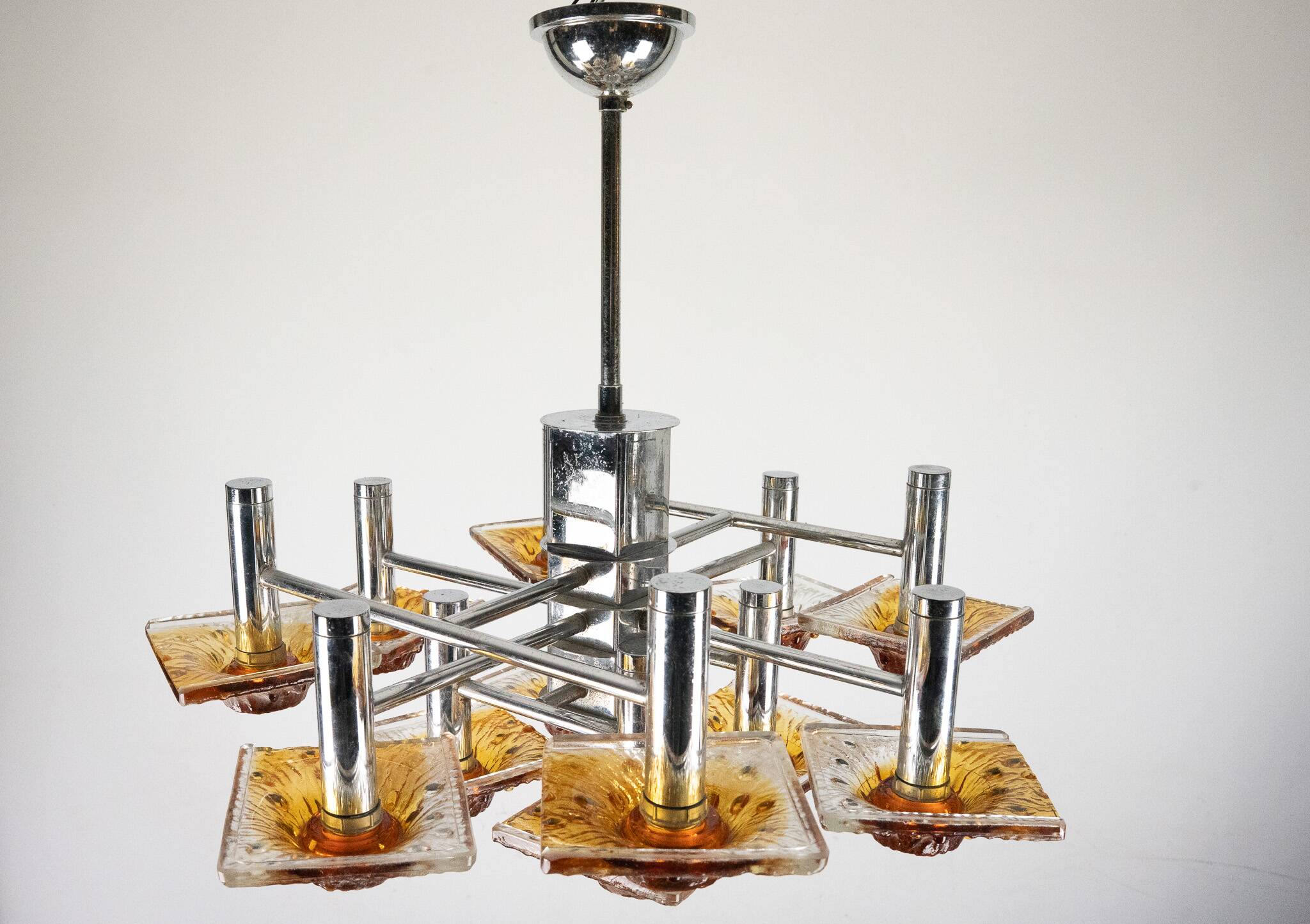 12-light Mazzega chandelier in amber and clear murano glass and chrome. Ita