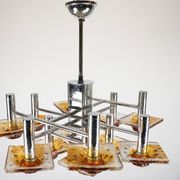 12-light Mazzega chandelier in amber and clear murano glass and chrome. Ita