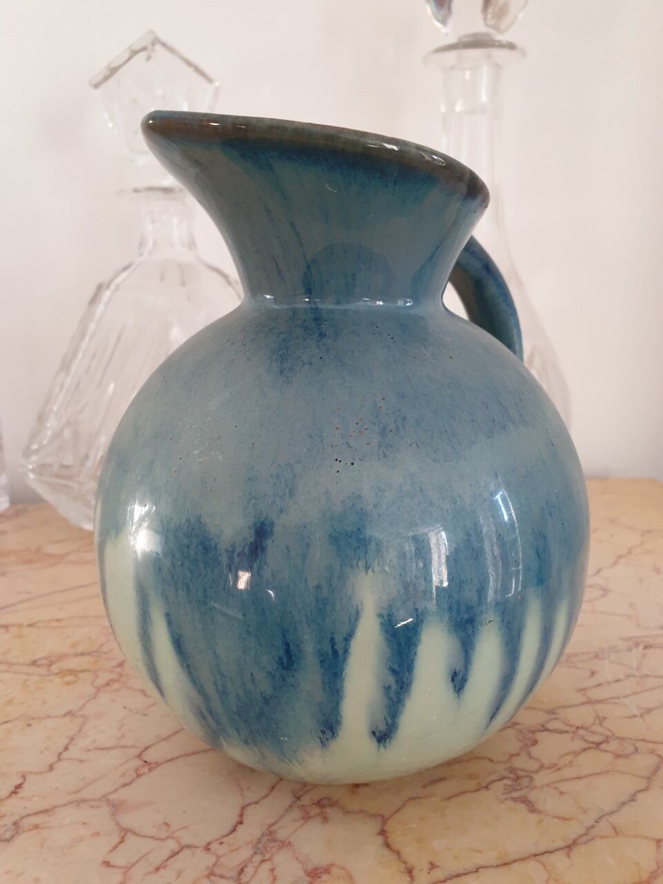 Glazed ceramic pitcher