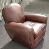 Club chair in brown leather