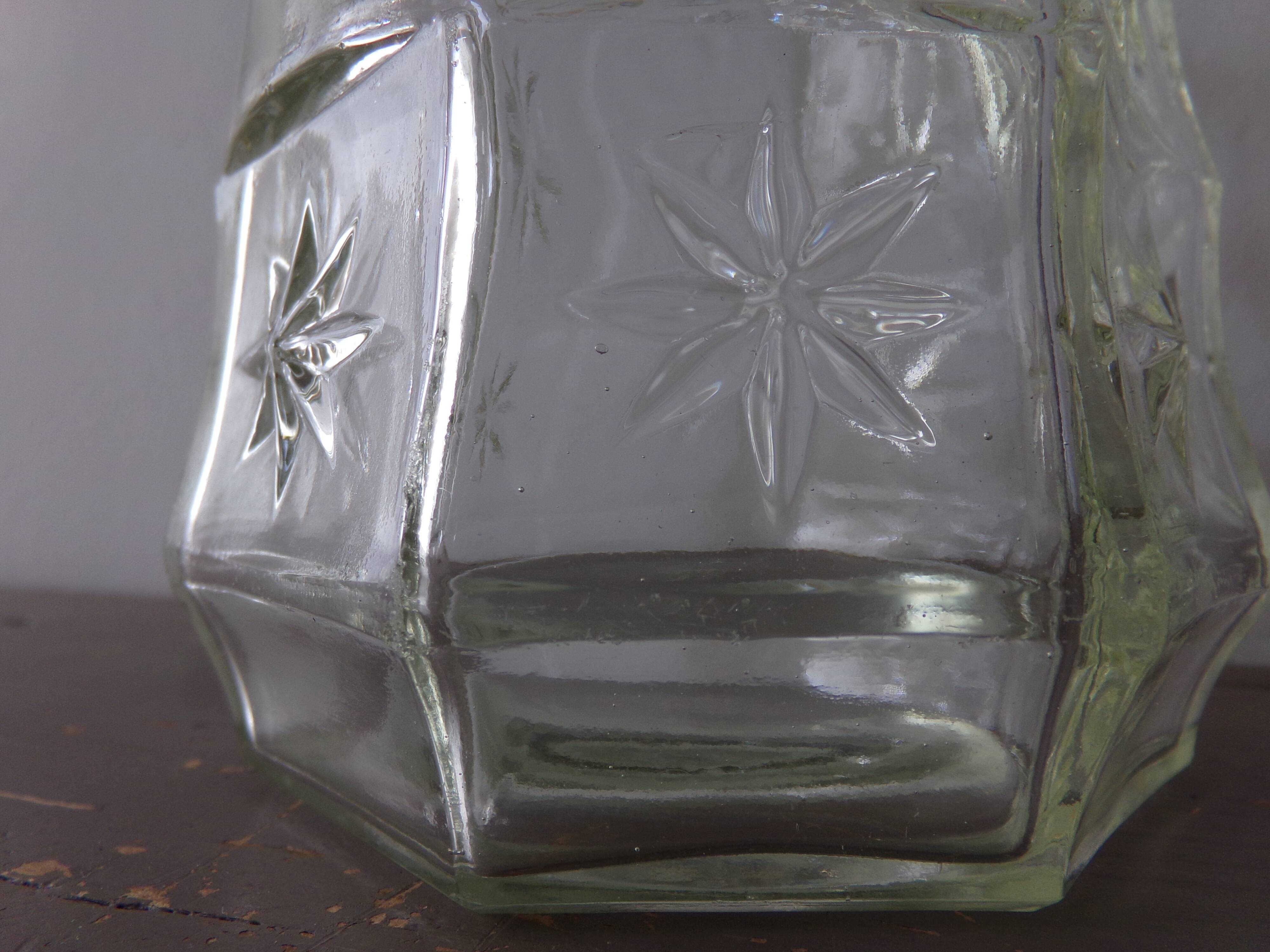 Chiseled glass bottle