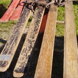 3 pairs of old skis