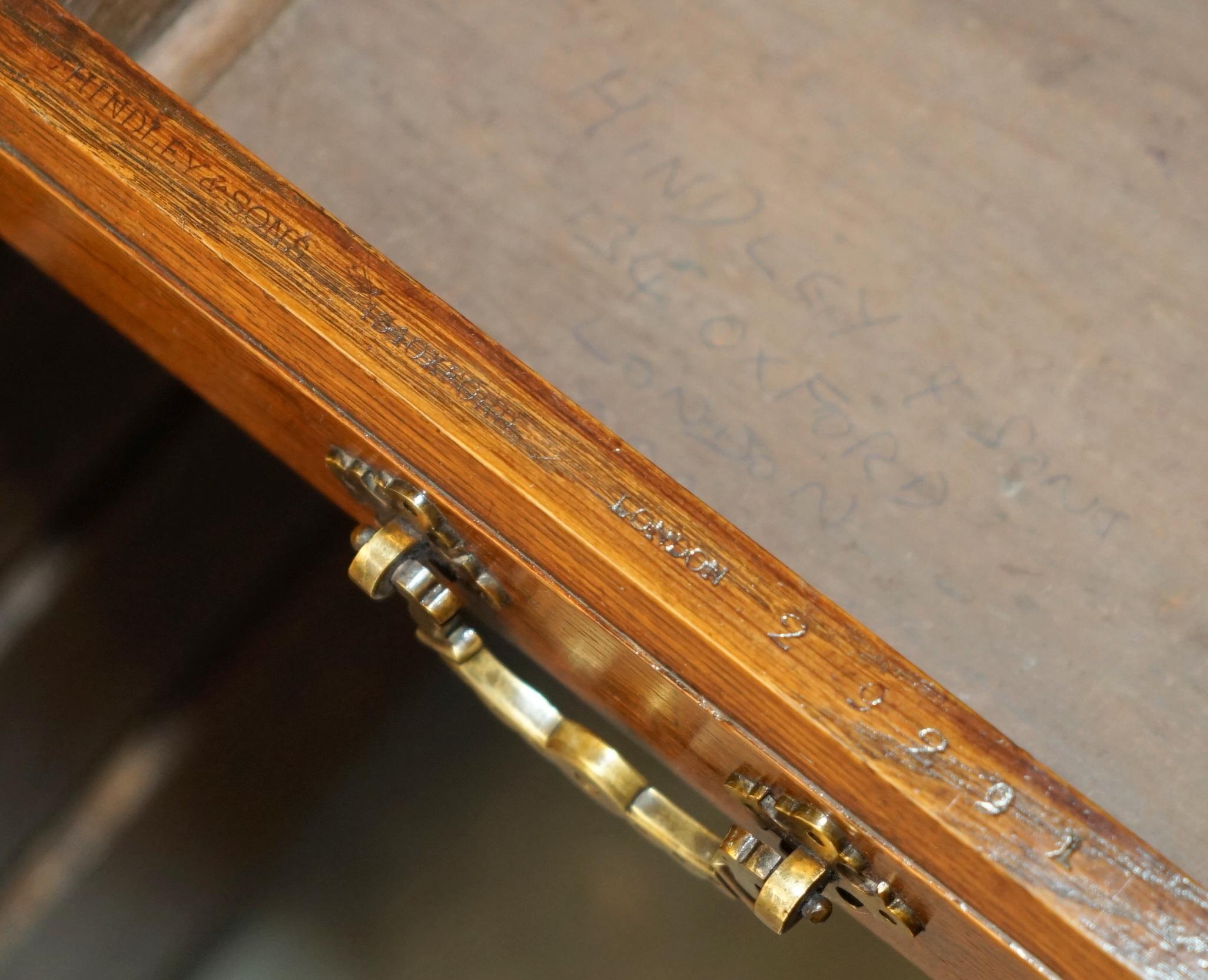 Antique double-sided desk C Hindley & Son in oak and leather