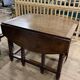 Solid wood farmhouse table with drop-leaves