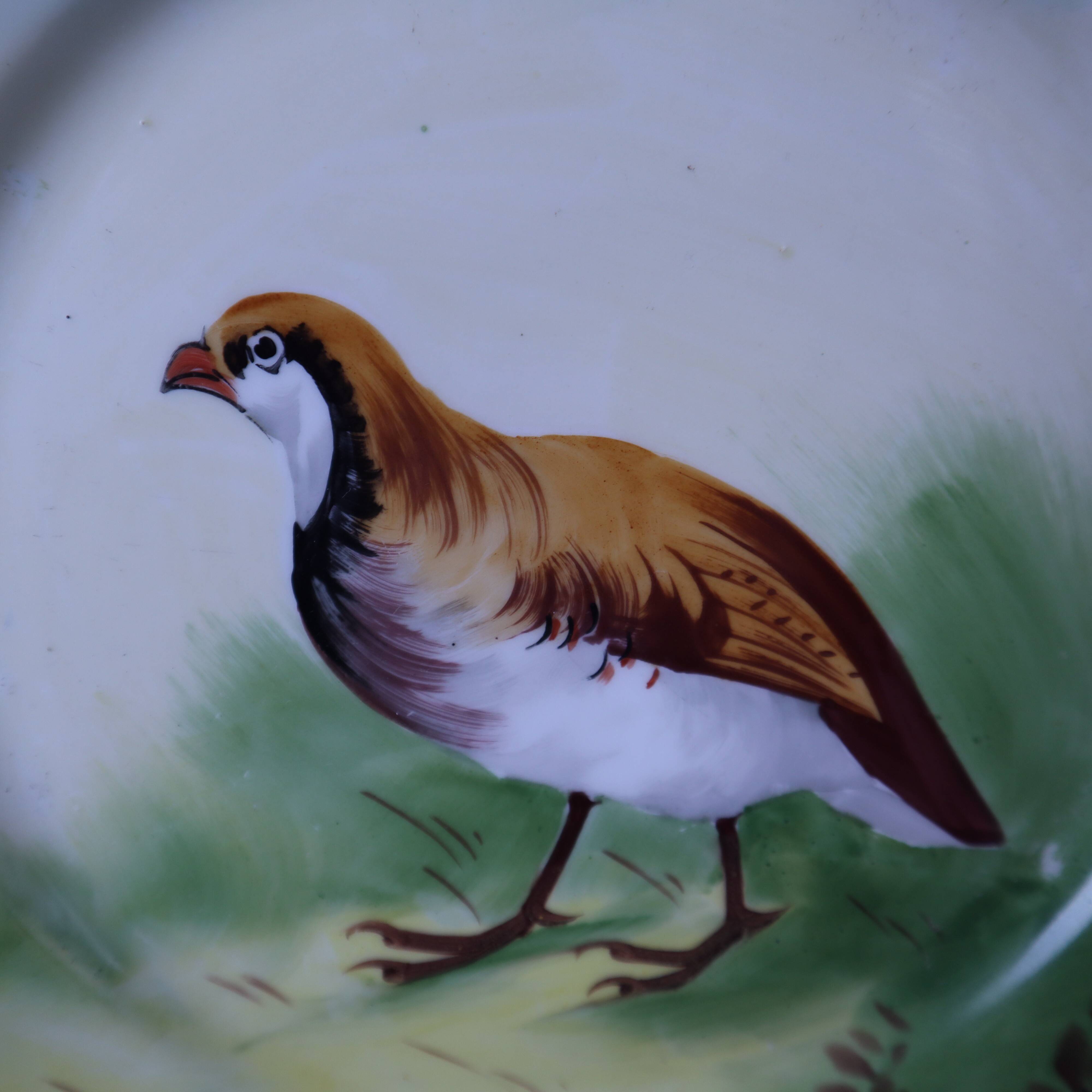 3 decorative porcelain plates from Limoges featuring partridges and pheasants.