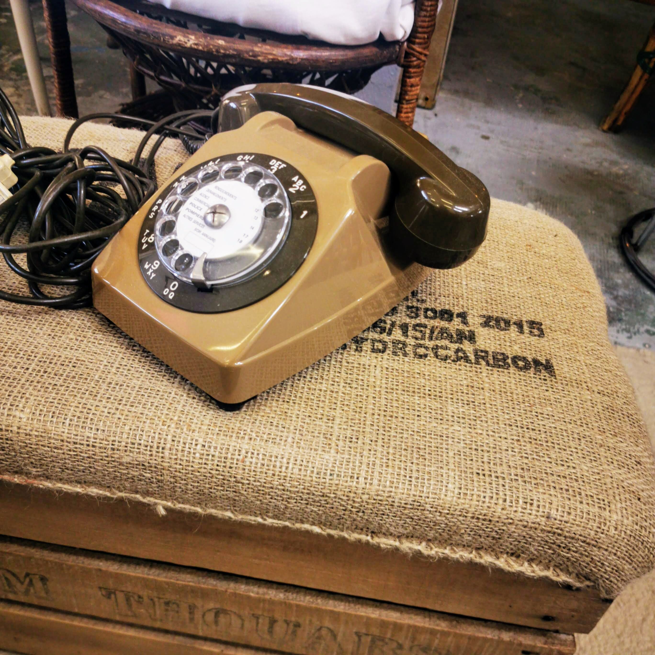 Brown dial phone