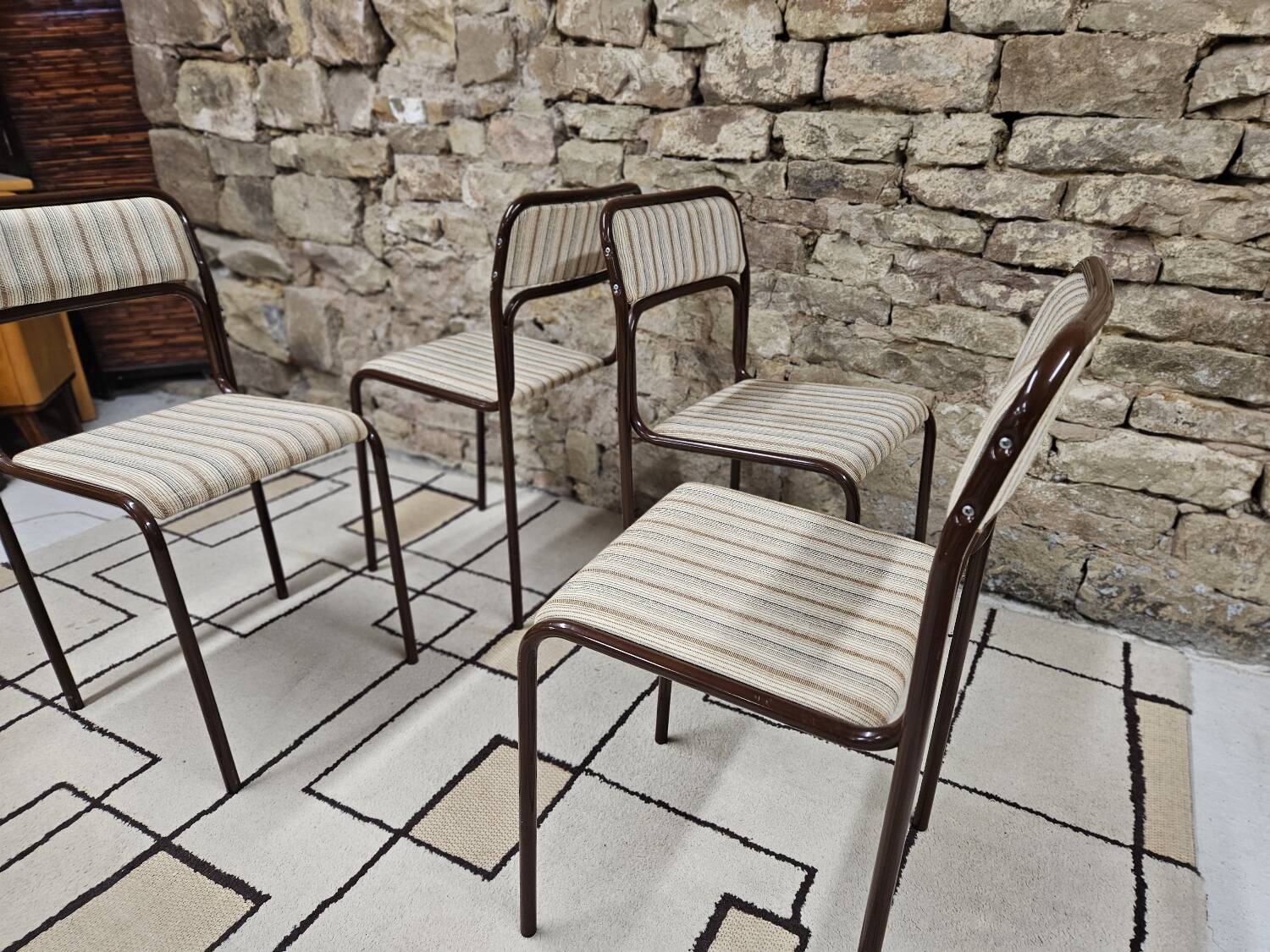 Set of 4 vintage stackable chairs 1980