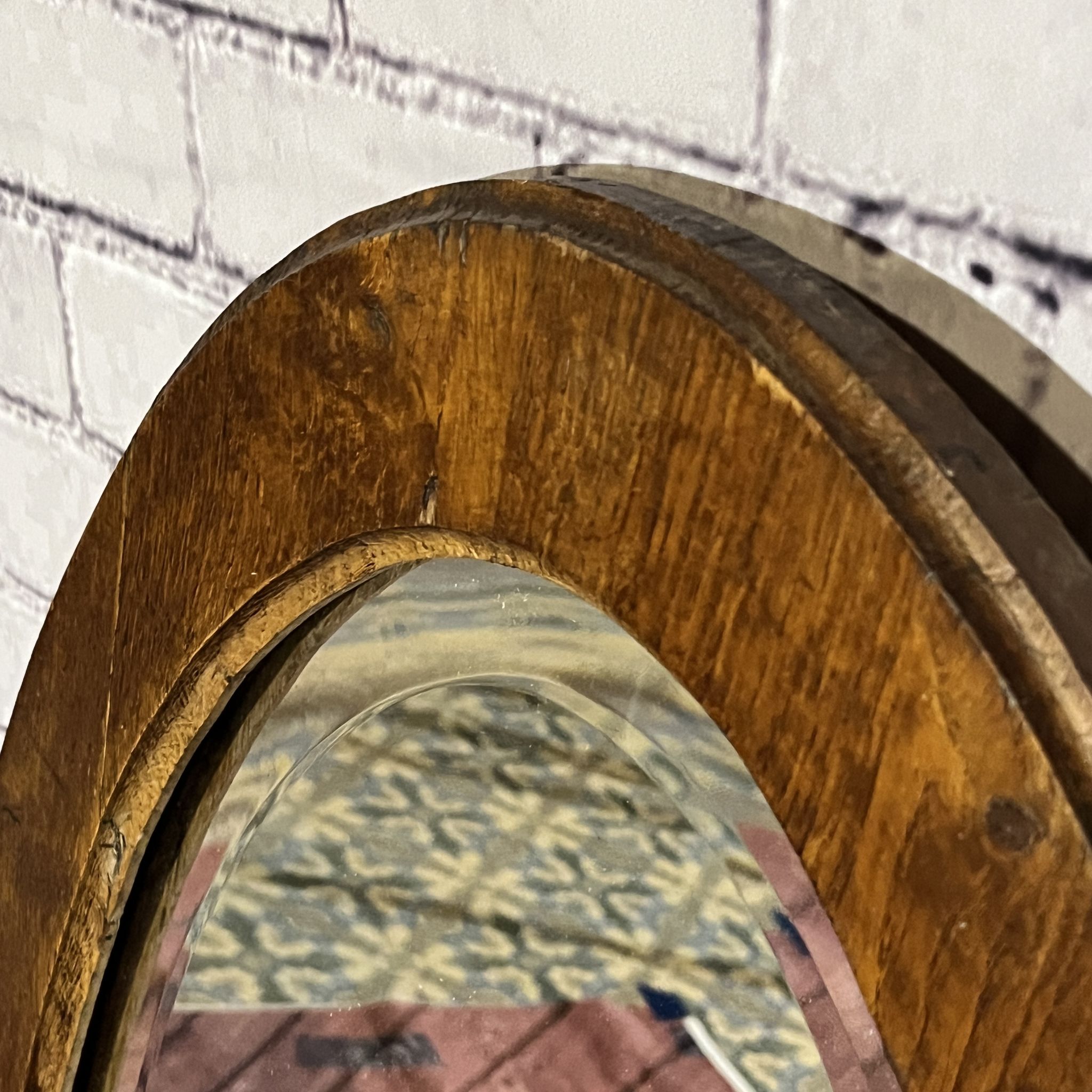 Oval beveled wooden mirror, 93x54 cm