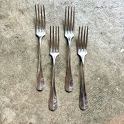 4 fourchettes en métal argenté