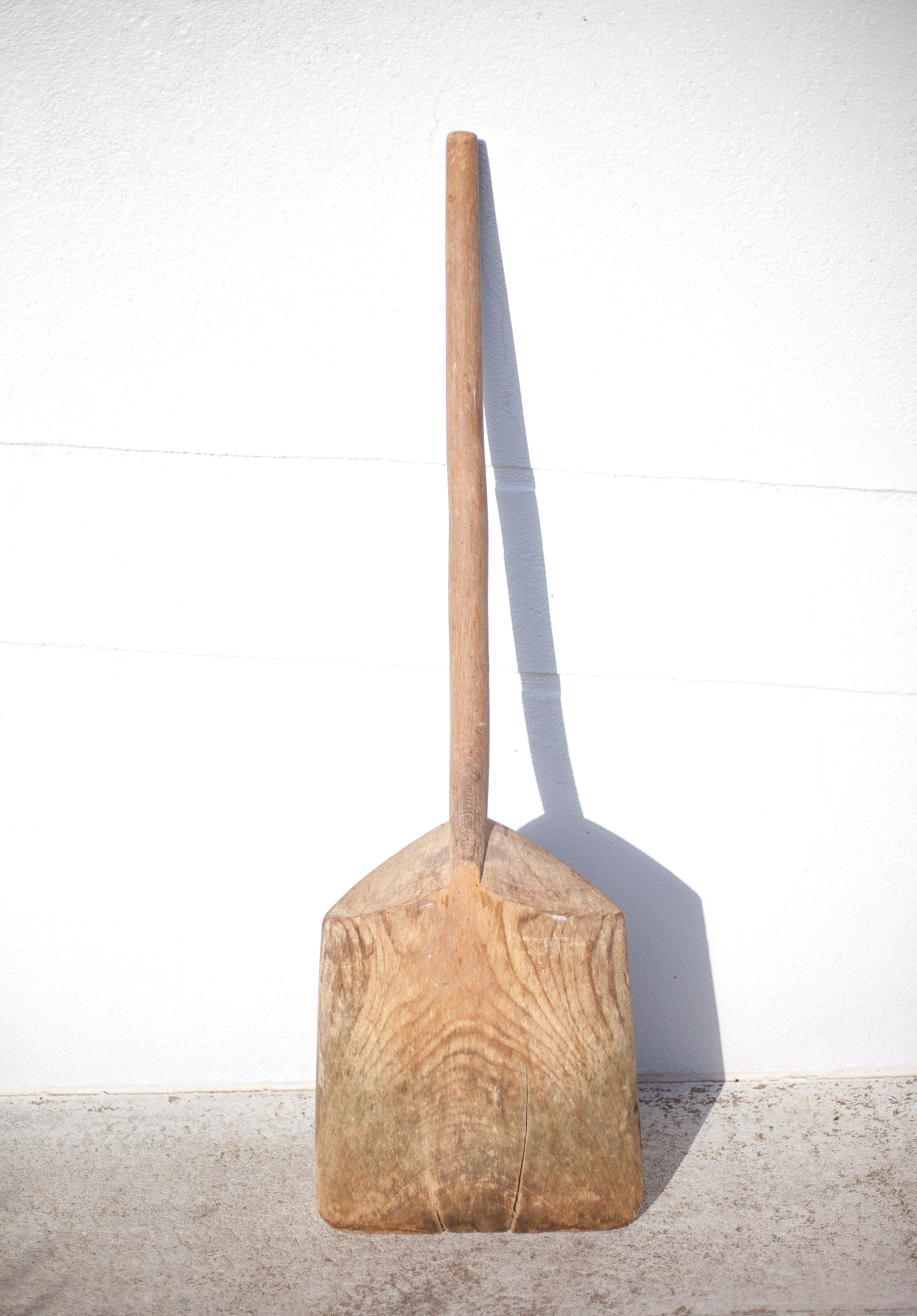 Old wood grain shovel, large wooden shovel, rustic, countryside, decoration
