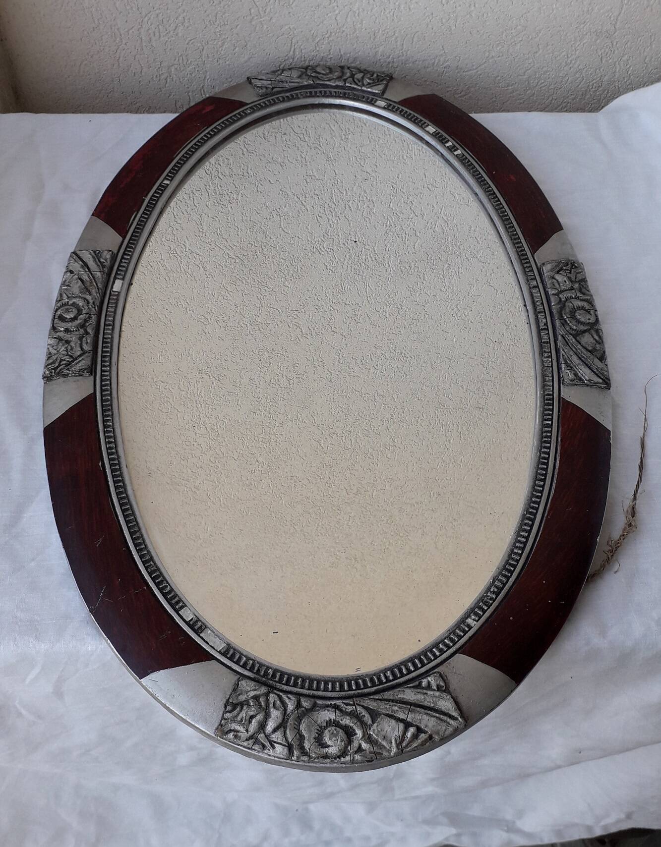 Oval wooden mirror