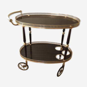 Golden wheeled serving trolley