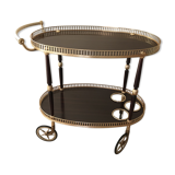 Golden wheeled serving trolley