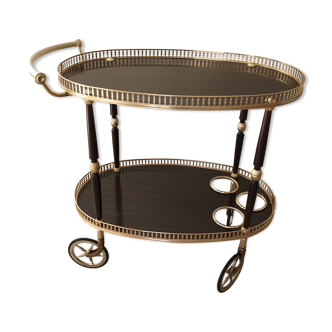 Golden wheeled serving trolley