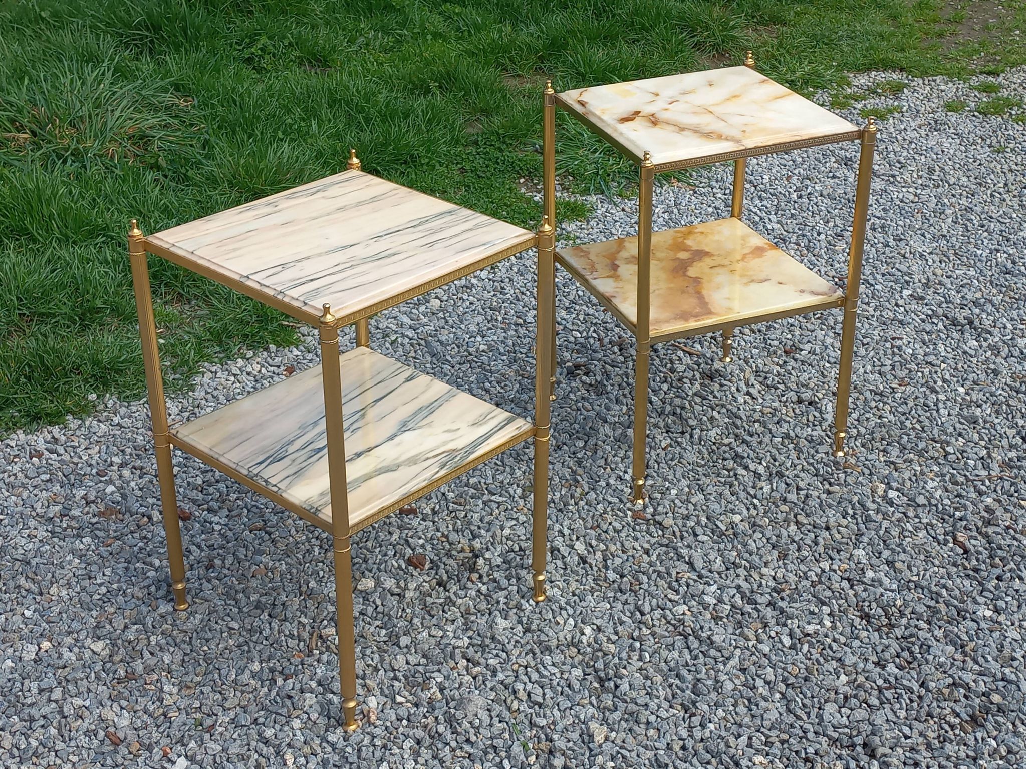 Pair of neoclassical side tables in bronze, brass, marble, and o.