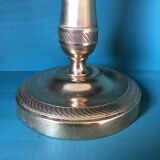 Large candlestick in chiseled brass