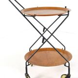 Trolley with loose round trays in the style of Jie Giantofte