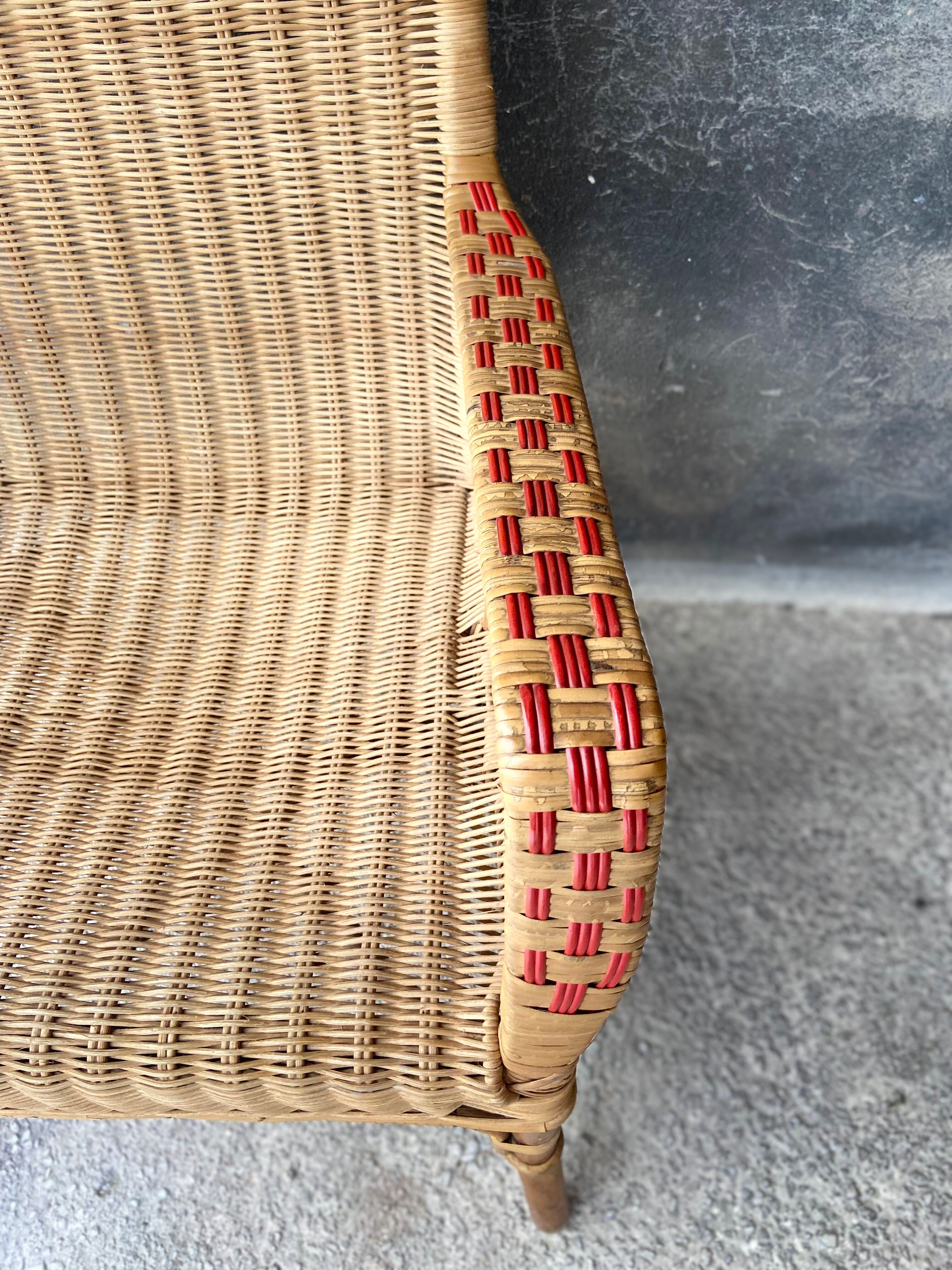 Vintage braided rattan armchair