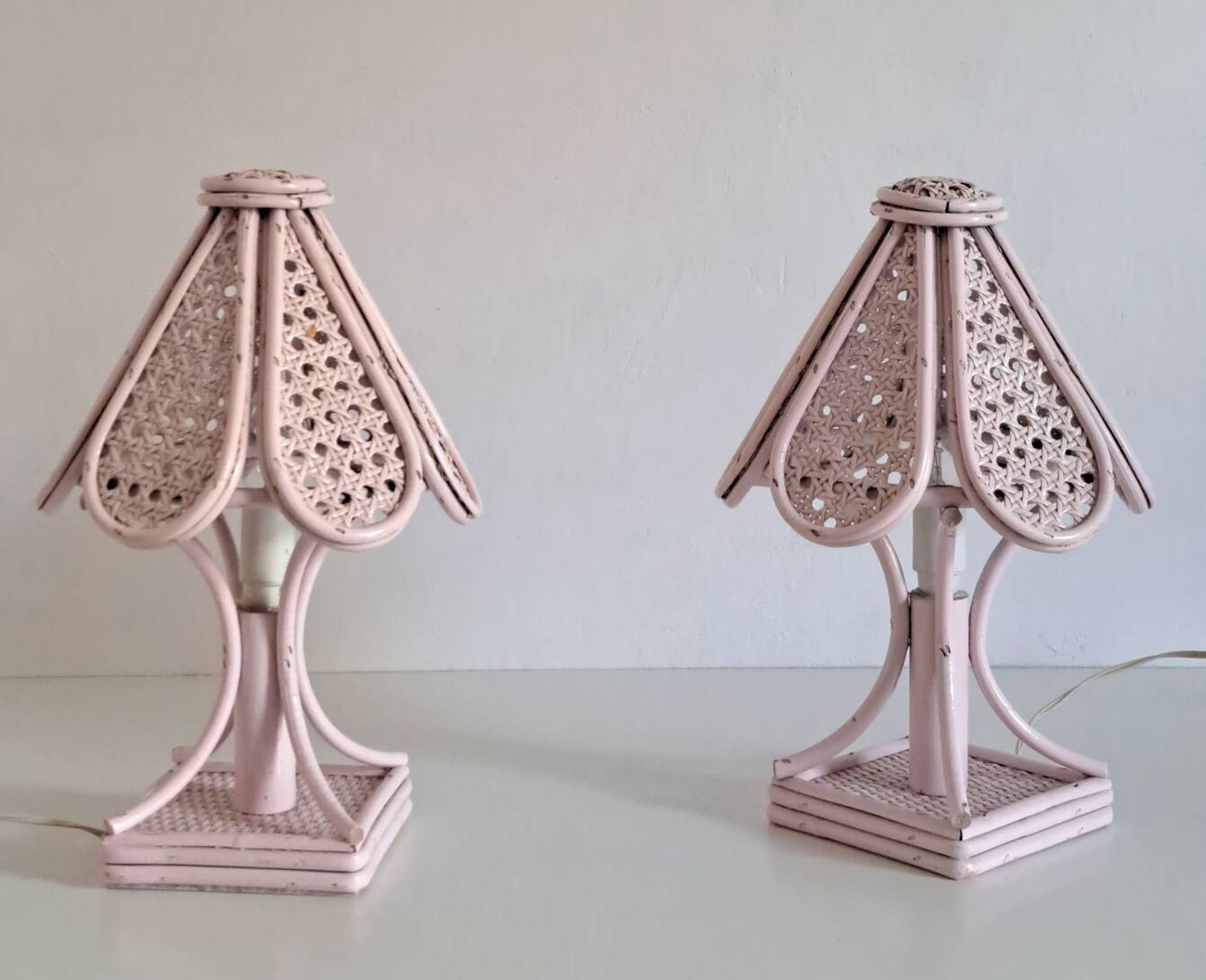 Pair of cane and bamboo bedside lamps