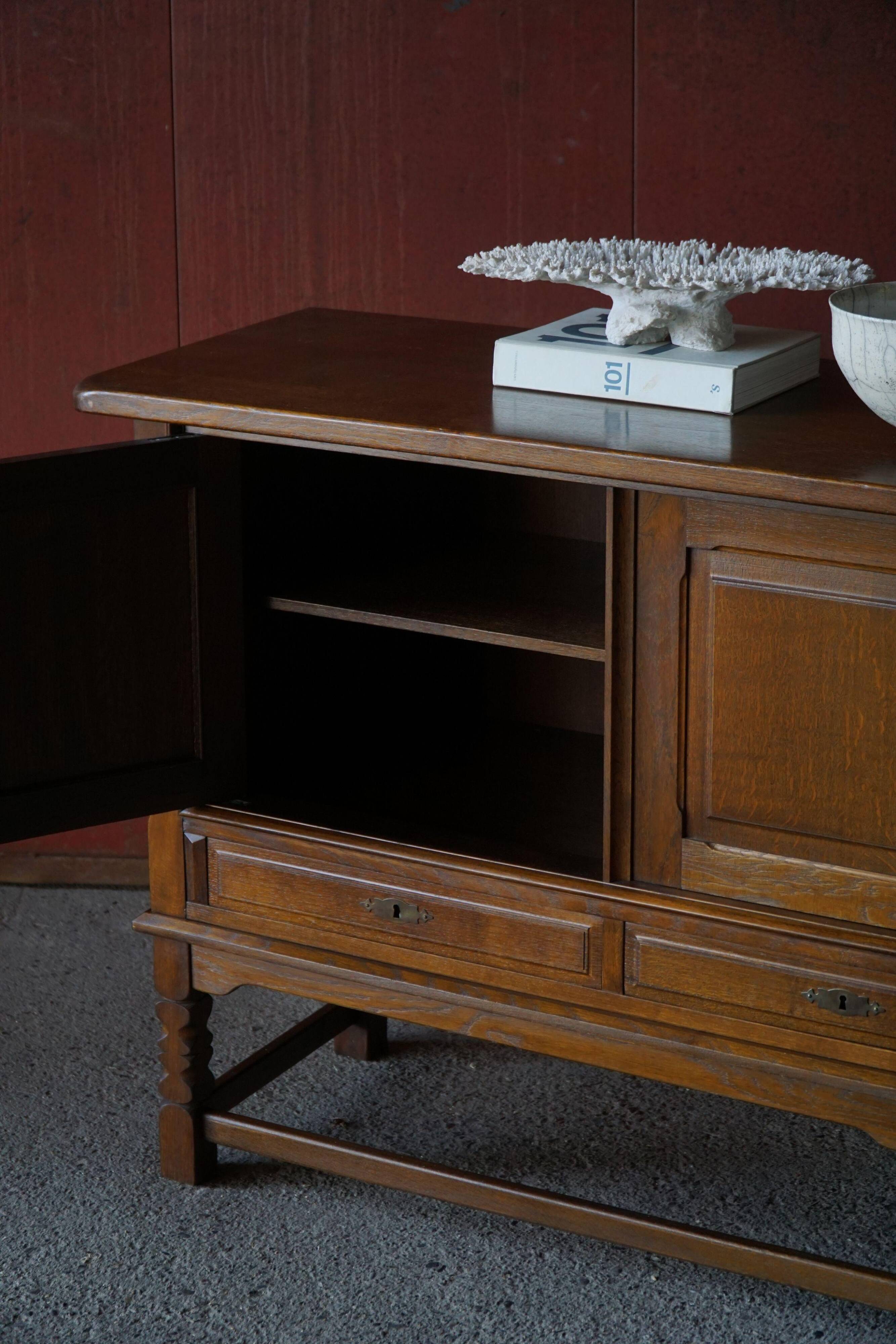 Danish enfilade from the mid-modern century in dark stained oak, 1960s.